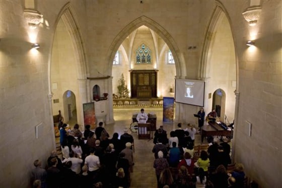 Members of Kristine Luken's Christian community attend a memorial in Jerusalem's old city on Thursday before her body was to be flown back to the U.S.